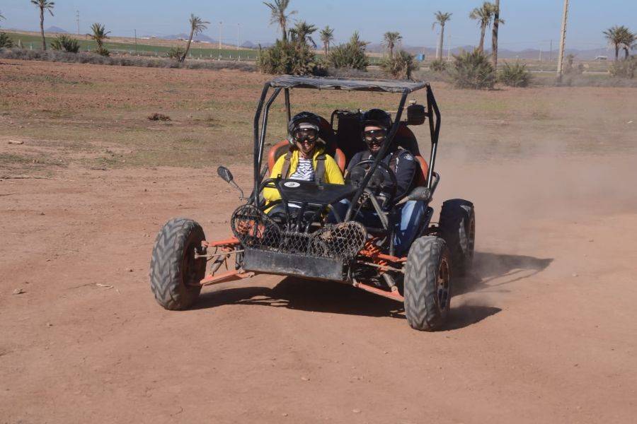Passeggiata in carrozzina di adrenalina e giro in cammello al Palmeraie Marrakech